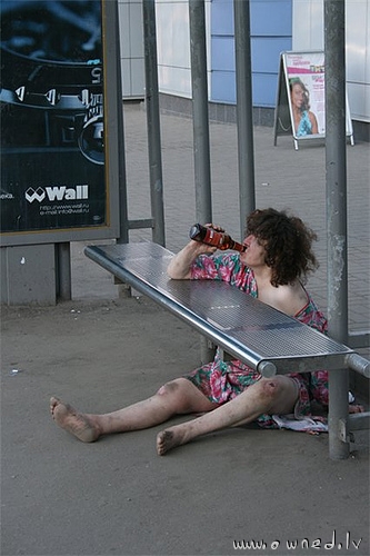 Drunk lady at the bus stop