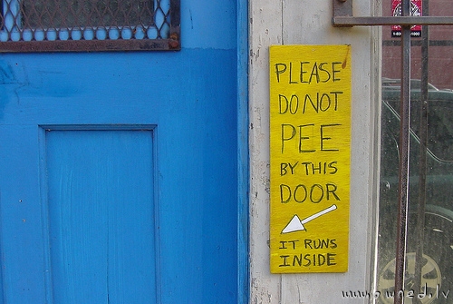 Please do not pee by this door